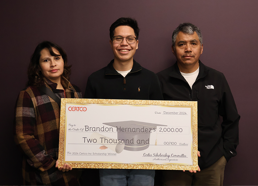 Winners holding check