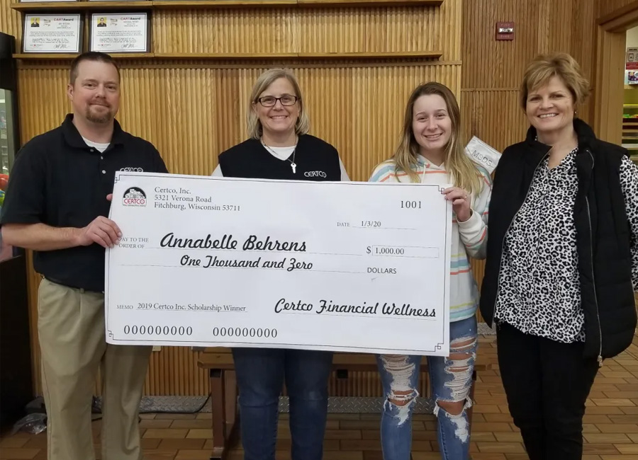 Winners holding check